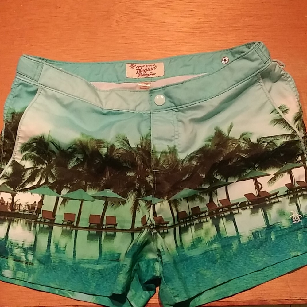 Penguin swim trunks.